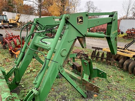 jd 245 loader skid steer attach|john deere 245 loader.